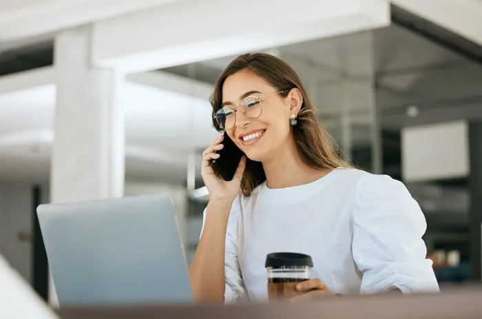 Business professional on a call with laptop